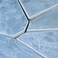 Verkotettu musta liuske